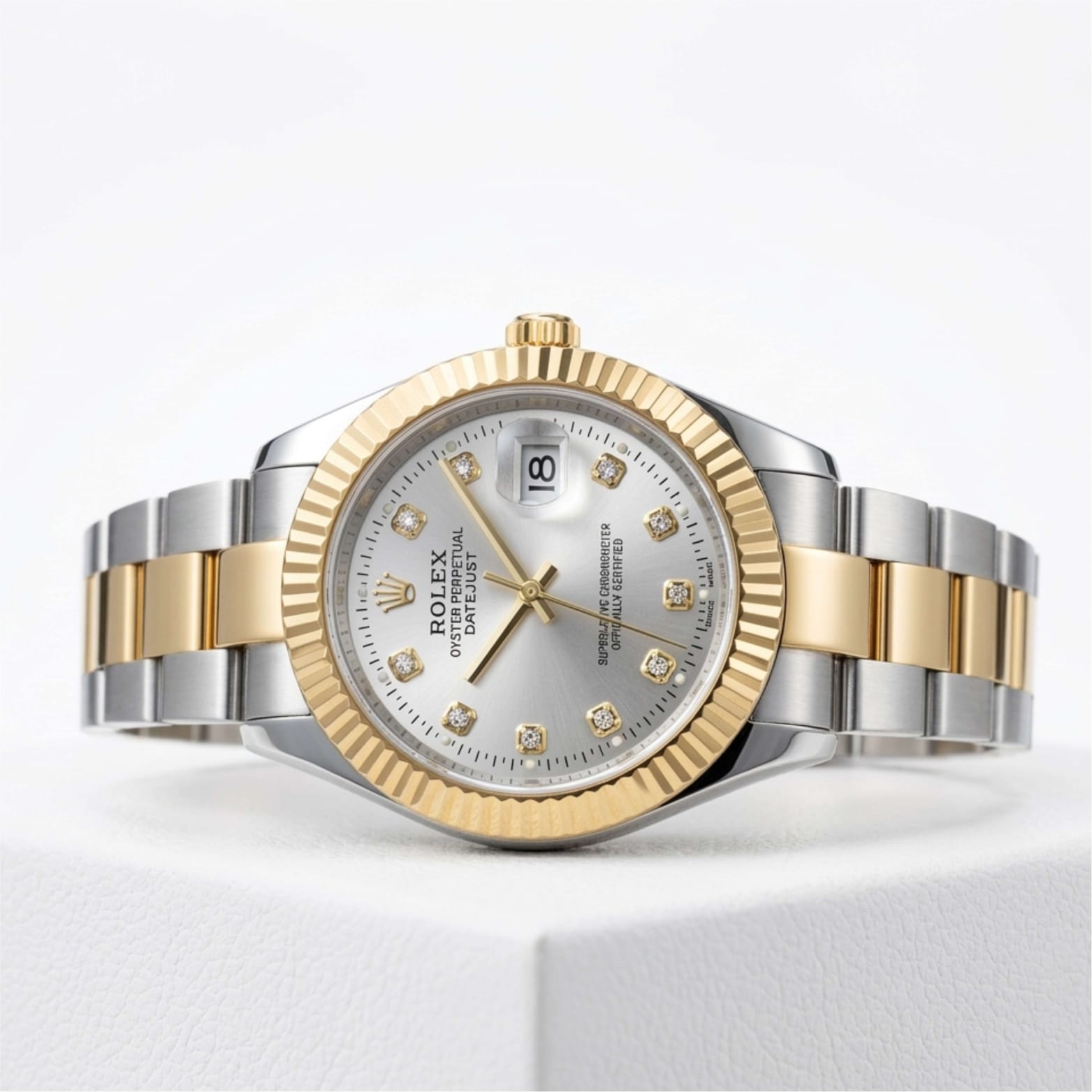Two-tone watch with diamond-studded face