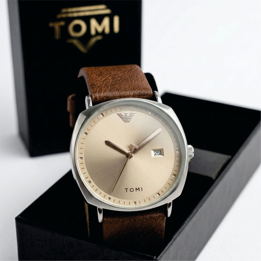 Watch with brown leather strap and gold face