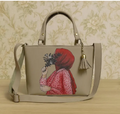 Faceless Girl Floral Print Tote Handbag – Premium PU Leather Shoulder Bag with Tassel Charm